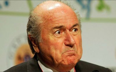 Sepp Blatter looks confused at a FIFA conference, like us when we read the Coach of the Year shortlist