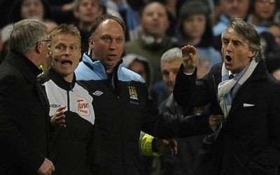 Ferguson and Mancini go head to head