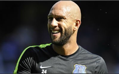 Tim Howard is all smiles as he trains for Everton ahead of Sunday's game against Tottenham