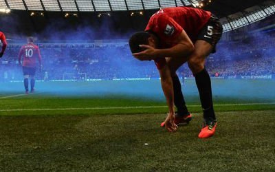 Rio Ferdinand was struck by an object thrown from the crowd last time United and City met.