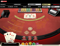 Three card poker player wins by showing three of a kind